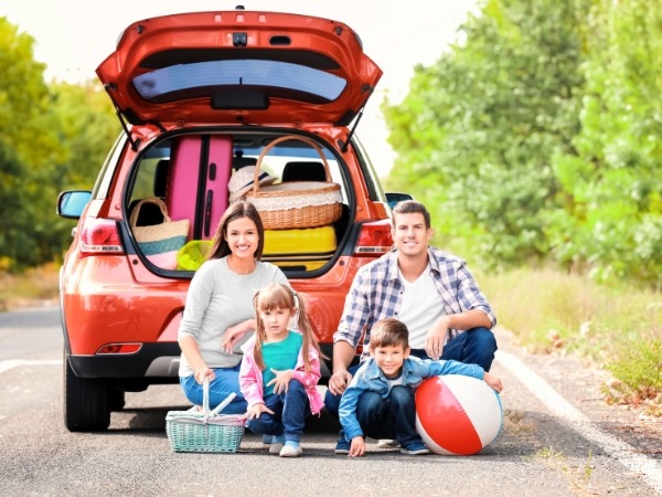 Family and a Red Car