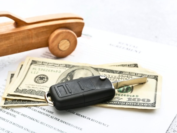 Rental Agreement with a Car Key and Money