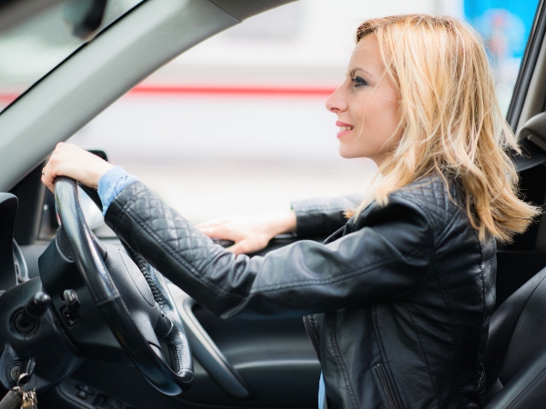 Woman Driving a Car