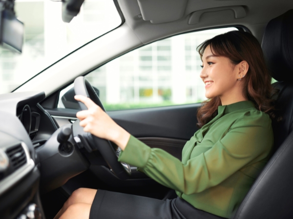 Woman Driving a Car