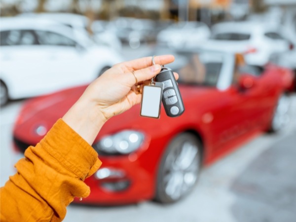 Woman Holding Car Keys