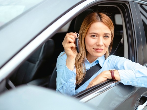 Woman Holding Car Keys