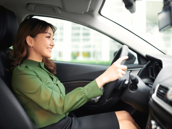 Woman Driving a Car