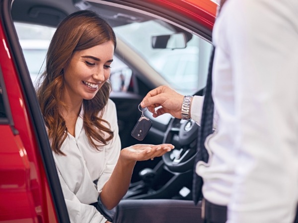 Woman Getting a Car Key