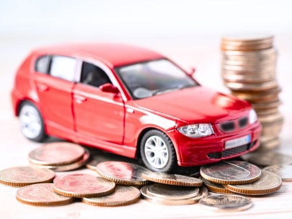 Miniature Red Car with Coins