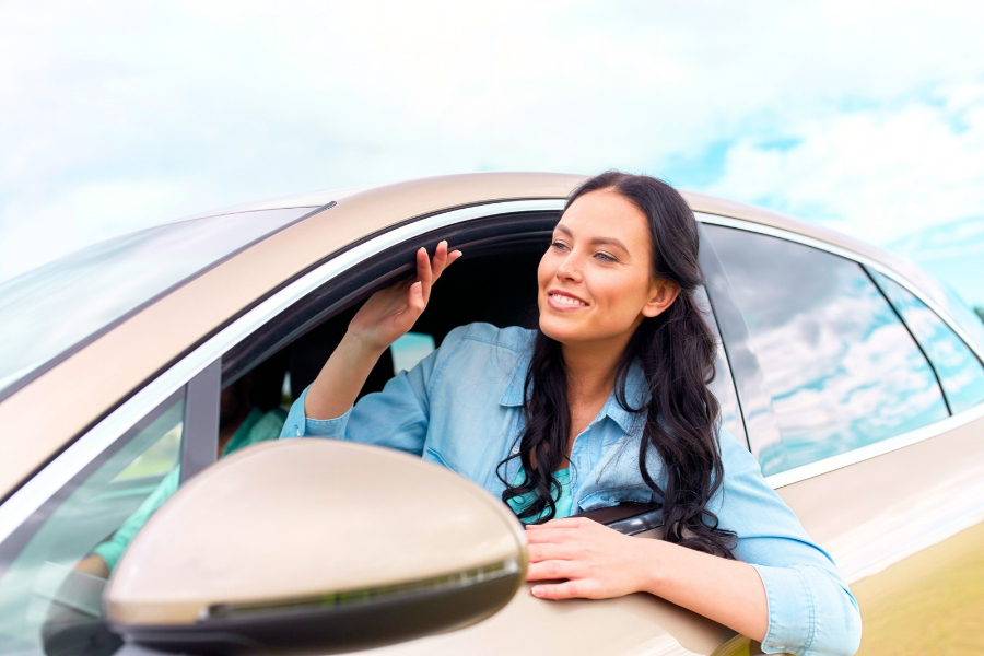 Woman with a Rental Car