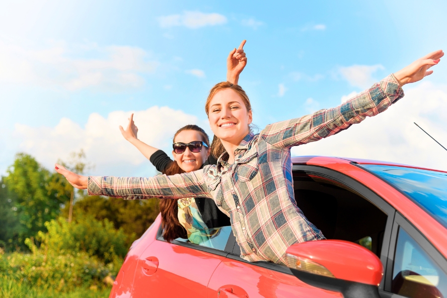 Woman Driving in Nature