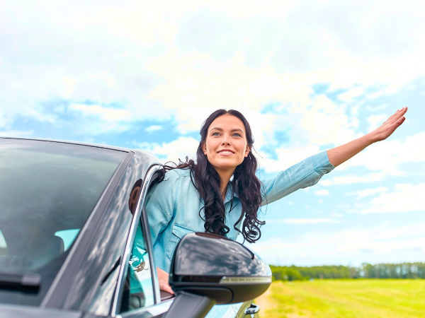 Woman with a Rental Car